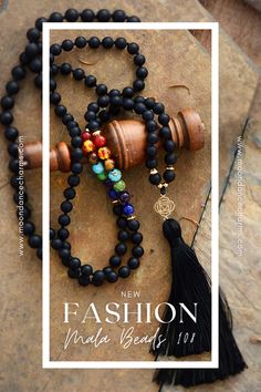 Chakra Mala Necklace. One of our favorite Chakra mala beads in our shop. This Mala is made of a combination of black onyx beads and the 7 beads that correspond to the seven chakra systems: Rose quartz, green aventurine, lapis lazuli, jasper, carnelian, amethyst, and tiger eye. The Mala ends with a Lotus Flower pendant and a black tassel. We offer a great selection of Japa mala 108 beads and 27. Our Malas are handcrafted and hand-knotted using natural stones. Check our website to see more>> Obsidian Beads Jewelry For Meditation, Obsidian 8mm Beads Jewelry For Meditation, Holistic Black Round Beaded Jewelry, Holistic Black Round Beads Jewelry, Handmade Black Mala For Meditation, Black Gemstone Beads Mala For Healing, Spiritual Obsidian Necklaces For Meditation, Onyx Bead Necklaces For Meditation, Spiritual Onyx Beaded Necklaces With 8mm Beads