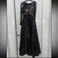 One Piece Long Gown Perfect For A Gala Or A Formal Event. Size 6p. Purchased For $299. Black And Goldmaybe More Of A Champagne Color. Long Sleeves. Stretch Tight On Top And Flows On Bottom. Black Embellished A-line Evening Dress, Formal A-line Evening Dress With Sequins, Fitted A-line Gown With Sequins, Black A-line Gown For Formal Occasions, Glamorous Evening A-line Gown, Evening Embellished A-line Gown, Holiday A-line Prom Gown, Long Sleeve Maxi Dress With Fitted Bodice For Party, Fitted Black Maxi Dress For Holidays