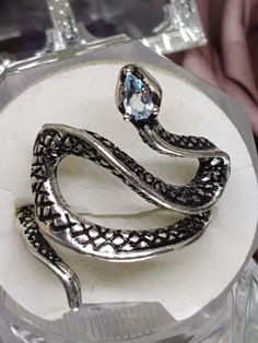 Crystal headed snake rings. Elegant Snake-shaped Metal Rings, Silver Metal Snake-shaped Ring, Elegant Snake Shaped Metal Rings, Silver Vintage Snake Ring, Elegant Metal Ring In Snake Shape, Vintage Silver Snake Jewelry, Elegant Silver Snake Ring, Adjustable Metal Snake Ring, Elegant Handmade Snake Ring