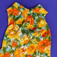 vtg 50s FLORAL DRESS // Marigold flower power psychedelic 60s mod slinky jersey mini shift dress sleeveless summer party hostess shawl    no brand tags feels like jersey polyester Fits like a medium zips up the back Measurements Lying Flat: shoulders:15" Bust:21" Waist:21" Hips:22" Length:39" sleeve opening: 8" Vintage V-neck Mini Dress For Summer, Summer V-neck Vintage Print Dresses, Retro V-neck Summer Dress, Vintage Short Sleeve Mini Dress For Beach, Mod Summer Beach Dresses, Summer Mod Beach Dresses, Mod Style Sleeveless Orange Dress, Retro Summer Party Dress, Retro Print Summer Dresses For Spring