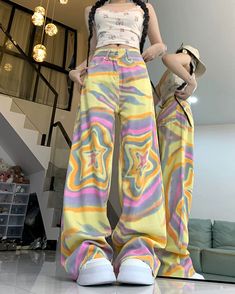 High-waisted yellow trousers with a vibrant star print in soft pastel tones. The wide-leg cut offers comfort and a throwback to 90s fashion Size: • S: Waist: 63cm/ 24.8 in, Hips: 96cm/ 37.8 in, Length: 102cm/ 40.2 in• M: Waist: 67cm/ 26.4 in, Hips: 100cm/ 39.4 in, Length: 103cm/ 40.6 in• L: Waist: 71cm/ 27.9 in, Hips: 104cm/ 40.9 in, Length: 104cm/ 40.9 in• XL: Waist: 75cm/ 29.5 in, Hips: 108cm/ 42.5 in, Length: 105cm/ 41.3 inMaterial: Cotton, Polyester Star Tie Dye, Star Tie, High Waisted Boyfriend Jeans, Denim Decor, Streetwear Jeans, Korean Streetwear, Tie Dye Pattern, Summer Street, Pants Fit