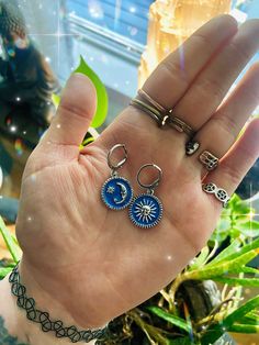 Beautiful sun and moon mix match earrings, beautiful. Comes in blue colour or black colour. Comes with hypoallergenic silver earring hoop clasps. Earrings Sun And Moon, Aesthetic Earrings, Witch Earrings, Earring Hoop, Hippie Earrings, Witchy Jewelry, Boho Aesthetic, Stretched Ears, Enamel Earrings