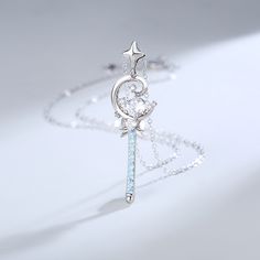 Cast your own spell with this charming wand pendant.This personalized necklace ticks all the boxes for what is deemed an ideal piece to adorn and dress up a sophisticated ensemble. Its daintiness lends a look a hint of romance and femininity.Chain Type: Weight: 5.06 gHeight: 44.8 mmMaterial: Plating Color: Silver Enchanting Silver Necklace, Magical Silver Charm Necklaces As Gift, Magical Silver Charm Necklaces For Gift, Magical Sterling Silver Necklace As A Gift, Magical Silver Pendant Necklace, Magical Sterling Silver Round Pendant Necklace, Sterling Silver Magical Round Pendant Necklace, Magical White Jewelry As A Gift, Magical White Jewelry As Gift