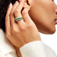 Top off your dressy looks with the bold triple-row design of this oval green emerald and diamond band in 10K gold. Crafted in warm 10K gold 3.0 x 2.0mm oval-shaped verdant-green emeralds glisten along the center. Two rows of diamonds create the sparkling borders. This ring captivates with 5/8 ct. t.w. of diamonds. Emerald And Diamond Band, Verdant Green, Gold Book, Green Oval, Emerald Stone, Oval Stone, Green Emerald, Diamond Band, White Stone