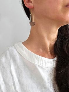 "| Long Loop Earrings | These semicircle geometric earrings are made with translucent acrylic and are perfect for everyday wear. They are lightweight and comfortable and would look great with various outfits. + Color: brown or white + Material: gold-filled, acrylic + Size: appx. 2.5\"h x .6\"w                   -------------- Made to order in the USA, please allow up to 1-2 weeks to ship. Please note that all jewelry is made to order and may vary slightly from the photograph. All jewelry is packaged in a gift box for giving or keeping. Don't forget to take a look at my shop policies before ordering for important information regarding turnaround times, shipping methods and returns." Modern Everyday Drop Linear Earrings, Modern Brown Earrings With Ear Wire, Modern Brown Drop Earrings, Chic Brown Earrings For Everyday Wear, Chic Brown Everyday Earrings, Chic Everyday Brown Earrings, Modern Jewellery Design, Loop Earrings, Earrings Minimalist