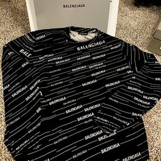 Oversized Balenciaga Crewneck Sweater. This Is A Men’s Size Small. My Husband Is Normally A Medium/Large And This Fits Him Perfectly. This Sweater Was Purchased In Las Vegas At The Balenciaga Store, 100% Authentic And Was Only Put On Once For Less Than 30 Mins... Brand New, Will Come With Clothing Slip As Shown (Gray Balenciaga Envelope). Willing To Sell For The Right Price. Composition Virgin Wool 95%, Polyester 4%, Polyamide 1% Dry Clean Only Designer Style Id: 555381t1524 Luxury Winter Sweatshirt With Letter Print, Luxury Logo Print Sweater For Winter, Luxury Winter Sweater With Logo Print, Luxury Long Sleeve Sweater With Logo Print, Black Luxury Jacquard Knit Sweater, Designer Winter Tops With Logo Print, Designer Logo Print Tops For Winter, Logo Pattern Long Sleeve Sweater For Fall, Long Sleeve Sweater With Logo Pattern For Fall