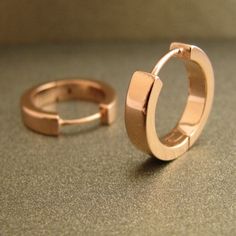 Large rose gold hoops for men in 12mm diameter. These men's hoops are made from sterling silver and plated in rose gold. At 3mm wide, they give a masculine and simple look. SPECIFICATION Base metal: Recyclable fine 925 Sterling Silver Outer layer: Shiny 18K rose gold, thick coating Outer diameter: 17mm Inner diameter: 13mm (size L) Width: 3.5mm Ear Post: 20G, standard Other sizes Medium hoops https://www.etsy.com/listing/57976444 Large hoops https://www.etsy.com/listing/54462674 Extra large hoop Rose Gold Polished Finish Huggie Earrings For Gift, Rose Gold Polished Huggie Earrings For Gift, Rose Gold Huggie Earrings With Polished Finish As Gift, Gift Rose Gold Huggie Earrings With Polished Finish, Rose Gold Polished Finish Hoop Earrings As Gift, Rose Gold Polished Hoop Earrings As Gift, Mens Earrings Hoop, Men Earrings, Large Hoop Earrings