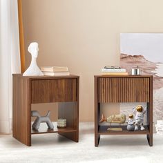 two wooden side tables sitting next to each other on top of a carpeted floor