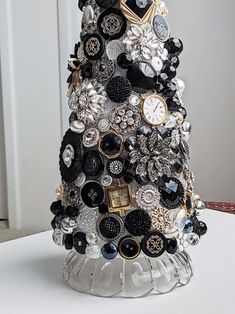 a christmas tree made out of buttons and other things