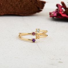 "14k Gold Minimalist Gemstone Ring, Rainbow Matchless Ring, Multi Colour Ring, Gift For Her, Tiny Rainbow Diamond Ring, Tiny Gemstone Ring   Item Details * Made to Order * Gold KT: 14K or 18K * Custom Gold Color: Rose Gold, Yellow Gold, White Gold * Total CTW: 0.26 ctw If you have any additional questions about this ring, just hit the \"Message \" button and we will get back to you within a few hours. ★ ★ ★ Each order will be beautifully packaged for gift giving in a jewelry box with an addition Modern Multi-stone Birthstone Ring For Promise, Dainty 14k Gold Cluster Ring With Gemstone, 14k Gold Multi-stone Stackable Rings, Modern Stackable Crystal Ring In Yellow Gold, Dainty Yellow Gold Cluster Ring With Gemstone, Modern Yellow Gold Birthstone Ring With Gemstone, Fine Jewelry 14k Gold Stackable Birthstone Ring, Stackable 14k Gold Birthstone Ring Fine Jewelry, Gold Amethyst Stackable Ring Fine Jewelry