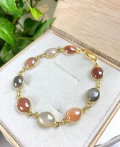 Moonstone Bracelet - Moonstone Jewelry - Multi Color Moonstone - Moonstone Garden Elegant Moon Phase Bracelet As A Gift, Elegant Moon Phase Bracelet As Gift, Elegant Moon Phase Bracelets, Elegant Moon Phase Bracelet For Gift, Elegant Moonstone Crystal Bracelet For Gift, Moonstone Natural Stone Bracelets, Gold Moonstone Gemstone Bracelets, Gold Moonstone Round Bracelets, Gold Moonstone Bracelet With Gemstones