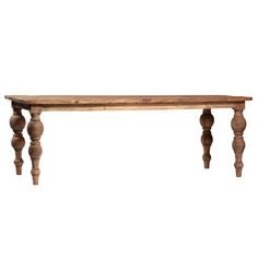 an old wooden table with turned legs on a white background for display or montage