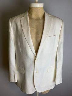 Classic Brooks Brothers Summer Irish Linen Sports Coat Blazer size 44R Baird McNutt Irish Linen Made in Thailand  2- button  Fully Lined  Center Vent Flap pockets  100% cotton  Great condition. 23-1/2" across the chest  19" shoulder to shoulder  26" shoulder to cuff  35" from top of collar fold to hem Classic Spring Sport Coat With Buttons, Classic Sport Coat With Buttons For Spring, White Spring Sport Coat With Button Closure, Casual Tailored White Suits, Casual White Tailored Suit, Casual Fitted Sport Coat With Suit Collar, Fitted Casual Sport Coat With Suit Collar, White Sport Coat With Pockets For Spring, White Sport Coat For Spring