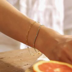 Feel like a fashion-forward paper pusher with this unique piece of statement jewelry! Our Hammered Paper Clip Chain Bracelet is here to shake up your jewelry box with its unique design. Gold vermeil SKU: SAB-0073 Modern Bracelet With Strap For Friendship, Chic Bracelet With Delicate Chain For Gift, Modern Friendship Bracelet Jewelry, Chic Delicate Chain Bracelet As Gift, Chic Delicate Chain Bracelet Gift, Chic Delicate Chain Bracelet For Gift, Gold Metal Beaded Bracelets For Friendship, Trendy Gold Bracelets With Box Chain, Jewelry With Adjustable Chain And Rectangular Links As Gift