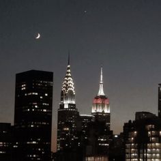 the empire building is lit up in red, white and blue