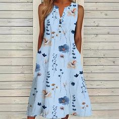 The Floral Printed Sleeveless Midi Casual Dress features a charming floral print and a sleeveless design, perfect for warm weather. Its midi length and relaxed fit offer both comfort and style, making it an excellent choice for casual outings and everyday wear. Beach Dress Summer, Sleeveless Dresses Casual, V Neck Midi Dress, Casual Vest, Midi Dress Casual, Sleeveless Floral Dress, Dress Cover, Loose Dress, Floral Sleeveless