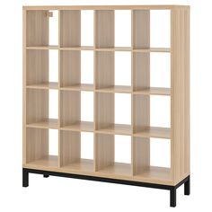 a bookcase with several shelves on each side and one shelf in the middle that is empty