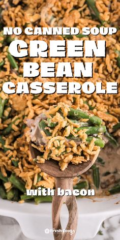 green bean casserole with bacon on a wooden spoon