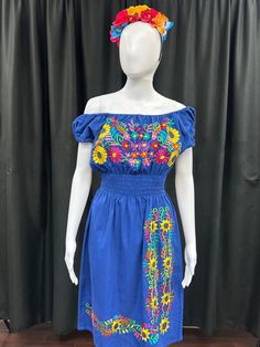 Beautiful dress with embroidered colorful flowers top to bottom. It is lightweight for every day wear. It has elastic on the waist and shoulders for a flirty look. Dress lenght is above knee. Every flower is stich by hand in Antigua Guatemala.   Headband not included. Embroidered Floral Dress, Dress With Elastic Waist, Floral Embroidered Dress, Flower Tops, Above Knee, Beautiful Dress, New Style, Guatemala, Colorful Flowers