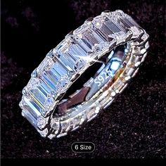 an image of a wedding ring with diamonds on it