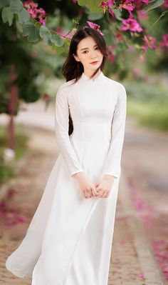 Hello , thanks for visiting my shop Brand New High Quality Vietnamese Ao Dai. Ao Dai for women 40-77 kgs *These are Asian size <>US Petite size .Please order 1,2 size bigger to your normal size  Full size XS/ S/ M/ L/ XL/ 2XL/ 3XL. S: burst 33in - waist 25in -length 55 in M: burst 35in -waist 27in  -length 55 in L: burst 37in -waist 29 in -length 55 in XL: burst 39in -waist 31 in -length 55 in XXL: burst 41in -waist 33in -length 55 in 3XL: burst 43in -waist 35in -length 55 in Please refer the si Traditional White Ao Dai For Formal Occasions, White Long Sleeve Plain Dress, Elegant White Ao Dai For Formal Occasions, Traditional White Formal Dress, White Fitted Ao Dai For Wedding, Traditional Fitted White Ao Dai, White Long Sleeve Ao Dai, Elegant Long White Ao Dai, Traditional White Long Sleeve Ao Dai