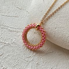 💖 Looking for the perfect Christmas gift for your best friend little sister? Look no further than this light pink & gold seed bead necklace pendant!  Handmade with love, this carnation boho beaded choker is surely to impress. Treat your loved one to these unique necklace that is sure to catch the eye! * MATERIALS * It is made of high quality Japanese seed beads. Because of it's shape there is no space between each bead in work. Each jewelry looks like it's made of metal not of glass This pendan Gold Round Bead Necklaces For Friendship, Pink Delicate Round Necklace, Pink Beaded Chain Jewelry For Gift, Dainty Pink Beaded Necklace With Tiny Beads, Rose Gold Beaded Chain Necklace For Gift, Rose Gold Jewelry With Gold Beads As Gift, Rose Gold Jewelry With Gold Beads For Gifts, Pink Tiny Beads Necklace For Jewelry Making, Pink Beaded Necklace With Tiny Beads For Gift