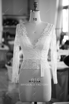 This designer V-neck bridal bolero composed of see-through long sleeve lace jacket with spaghetti straps sweetheart neck crepe crop top wedding separate underneath. An elegant wedding top could complement all styled bridal skirt. shown color light ivory bra support yes boning yes closure lace top+side zipper, bustier+lace up lining partially lined Bridal Separates Tops, Wedding Separates, Bridal Skirt, Bra Support, Bridal Skirts, Bridal Bolero, Bolero Wedding, Bridal Tops, Wedding Top