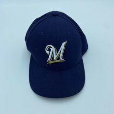 About this item Condition: Used: Seller Notes: “Pre-owned item in good condition” Brand: New Era Cap is a brand with an authentic sports heritage with Variety of Caps/Hats Sport: Baseball-MLB Pre & Post Season: Regular Season Size: 7 Color: Black & Navy Product: Hat, Cap Featured Refinements: MLB Hat Team: Milwaukee Brewers American professional baseball team based out in Milwaukee Gender: Unisex Adult Country/Region of Manufacture: United States Flat Brim Fitted Hat For Baseball Season, Throwback Baseball Cap For Baseball Season, Classic Snapback Fitted Hat For Sports, Baseball Season Fan Merchandise Fitted Cap, Six-panel Fitted Hat With Embroidered Logo For Sports, Classic Snapback Fitted Hat For Fan Gear, Classic Snapback Fitted Hat For Fans, Curved Brim Baseball Cap For Baseball Season, Curved Brim Baseball Cap For Fans