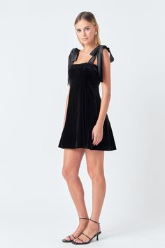 Stay fashionable and stylish with our Satin Tie Velvet Mini Dress! This chic dress features a luxe velvet material combined with a satin bow tie shoulder detail for an elegant look. It has a mini-length and a fit-and-flare silhouette for a flattering shape. Upgrade your wardrobe with this must-have mini dress and ensure all eyes are on you. Velvet material Satin bow tie shoulder Fit-and-flare silhouette Mini dress , shop the look and boost your style today! Velvet Satin shoulder bow tie Mini len Icon Clothing, Velvet Mini Dress, Dress Satin, Velvet Material, Mini Velvet Dress, Satin Bow, Chic Dress, Clothes Gift, Velvet Dress