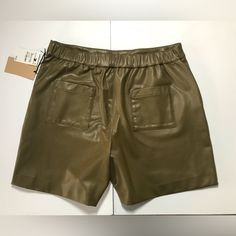 Halogen Cute New Olive Faux Leather Shorts With Pockets And Elastic Waist. Two Minor Indentations On Waist (See Pictures). Casual Leather Shorts For Fall, Casual Leather Bottoms In Solid Color, Casual Solid Color Leather Bottoms, Casual Solid Leather Bottoms, Casual Faux Leather Shorts For Fall, Casual Leather Shorts For Spring, Casual Faux Leather Shorts For Spring, Casual Short Leather Bottoms, Casual Leather Shorts