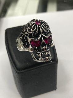 It is a carefully crafted product made of 925 sterling silver. Gothic Silver Skull Ring, Skull Shaped Sterling Silver Ring In White Gold, Skull Shaped Symbolic Jewelry Stamped 925, Symbolic Skull Shaped 925 Stamped Jewelry, Symbolic Engraved Skull Ring, Gothic Skull Ring For Formal Occasions, Sterling Silver Skull Ring Gift, Formal Gothic Skull Ring, Gothic Skull Rings With Engraving