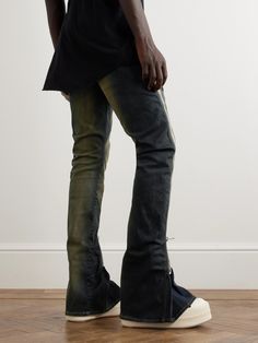 DRKSHDW by Rick Owens' 'Bolan Banana' jeans are named for their sculptural zips that wrap up the legs and allows you to change their shape from tapered to flared. They've been made in Italy from stonewashed denim and finished with a cool brown print. Designer Fitted Jeans, Luxury Denim Jeans For Streetwear, Designer Straight Leg Jeans For Streetwear, Designer Fitted Bottoms For Streetwear, Cool Brown, Embellished Jeans, Rick Owens, Straight Jeans, Fashion News