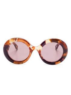 burnt orange/multicolour recycled acetate tortoiseshell effect round frame brown tinted lenses logo print at the arm oversize arms curved tips These glasses come with a protective case. This item is made from at least 50% recycled or upcycled materials. For recycled synthetic clothing products, we highly recommend using a microfibre-catching washing bag to ensure that no microplastics that can pollute water are released in the process. Learn more about what makes a product Conscious on our Conscious Criteria page Lens Logo, Gucci Eyewear, Upcycled Materials, Iconic Bags, Demi Fine Jewelry, Boots Fall, Round Frame, Flat Boots, Fine Earrings