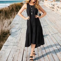 Bring A Little Bit Of The Island With You Anywhere You Go, With The Lena Gauze Midi Sundress. With Its Light-As-Air Feel And Breezy Cut, This Sundress Will Brighten Up Any Warm-Weather Wardrobe And Leave You Feeling On Cloud Nine. Armpit To Armpit 19 1/2” Length Front 45”, Back 52” Beach Vacation Travel Feminine Contemporary Black Sleeveless Midi Dress For Vacation, Black Midi Sleeveless Summer Dress, Black Midi Length Sleeveless Summer Dress, Black Sleeveless Midi Summer Dress, Black Sleeveless Midi Dress For Summer, Black Knee-length Midi Dress For Vacation, Black Knee-length Beach Midi Dress, Knee-length Black Midi Dress For Beach, Black Knee-length Midi Dress For Beach