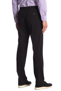 Fit: this style fits true to size. Zip fly with hook-and-bar and button closure. Front slash pockets; back besom pockets. Solid black. Light stretch. Approx. 10.5" rise (size 34x32). Imported Black Elastane Business Pants, Black Stretch Dress Pants For Business, Fitted Black Business Dress Pants, Black Fitted Dress Pants For Business, Fitted Black Dress Pants For Business, Tailored Black Work Pants For Business Casual, Tailored Black Elastane Dress Pants, Black Tailored Elastane Dress Pants, Semi-formal Stretch Black Dress Pants