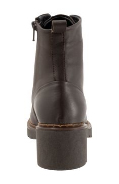 This modern boot is emboldened with a combat-style silhouette, adjustable laces, a side-zip closure and a rugged rubber sole for a commanding look. 2" heel; 3/4" platform 5 1/4" shaft Lace-up style; side zip closure Cushioned footbed with arch support Leather upper and lining/rubber sole Made in Turkey Outdoor Ankle Combat Boots With Zipper, Outdoor Ankle Combat Boots With Leather Footbed, Outdoor Ankle Lace-up Boots With Zipper, Outdoor Lace-up Ankle Boots With Zipper, Leather Ankle Work Boots With Padded Ankle, Outdoor Ankle Combat Boots With Leather Sole, Rugged Ankle-high Combat Boots With Reinforced Heel, Leather Footbed Ankle Combat Boots, Outdoor Lace-up Ankle Boots With Leather Lining