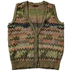 Vintage 90s Coogi Style Cardigan Vest Sleeveless Sweater for men - Classic Retro Knit Dive into the nostalgia of the 90s with this eye-catching vintage Coogi style v cardigan sweater! Inspired by the iconic designs of Coogi Australia, this sweater features the same bold patterns and vibrant colors that defined an era. Perfect for fashion lovers who appreciate unique, statement pieces. Features: Era: 1990s Style: Coogi-inspired Material: High-quality cotton blend (Soft, warm, and durable) Design: Y2k Sleeveless Winter Vest, Retro Cotton Sleeveless Sweater, Retro Green Sweater Vest For Winter, Retro Sleeveless Sweater For Winter, Retro Sleeveless Cotton Sweater, Retro Sleeveless Winter Sweater, Vintage Sleeveless Sweater For Winter, Vintage Sleeveless Winter Sweater, Vintage Green Vest For Fall