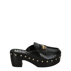 Heel Height: 2.75"; Platform Height: 1.375" | Slides On | Logo Lettering At Vamp | Round Toe | Textured Patent Finish | Studs Border The Sole | Spot Clean | Upper: 100% Leather; Lower: 100% Wood | Made In Italy Formal Slip-on Clogs With Reinforced Heel, Black Almond Toe Clogs For Formal Occasions, Formal Black Almond Toe Clogs, Designer Round Toe Sandals For Work, Formal Mules With Wooden Heel And Round Toe, Chic Formal Clogs With Reinforced Heel, Designer Workwear Sandals With Round Toe, Luxury Formal Clogs With Open Heel, Chic Leather Clogs For Formal Occasions