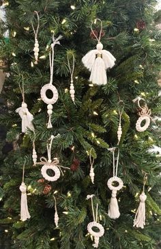 a christmas tree with ornaments hanging from it