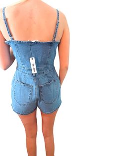 Cami denim romper with button front and pocket. Medium Wash Denim Top, Relaxed Fit Shortalls For Summer, Relaxed Fit Summer Shortalls, Relaxed Fit Overalls For A Day Out, Summer Shortalls Overalls With Pockets, Chic Denim Blue Jumpsuits And Rompers With Pockets, Chic Cotton Shortalls Overall, Summer High Waist Denim Jumpsuit With Pockets, High Waist Denim Jumpsuit With Pockets For Summer