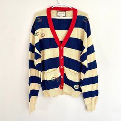 Gucci vintage blue striples longsleeves * One Only* Shoulder 25 inc. Sleeves 26 inc. Chest 22 inc. Length 28 inc. " All the details as shown as the picture " Condition : 9/ 10 Good condition. For more info. Please feel free to message us. Long Sleeve Cardigan With Striped Cuffs For Fall, Fall Cardigan With Striped Cuffs And Long Sleeves, Winter Long Sleeve Cardigan With Striped Cuffs, Winter Cardigan With Striped Cuffs And Long Sleeves, Long Sleeve Cardigan With Striped Cuffs For Winter, Oversized Retro Long Sleeve Cardigan, Oversized Striped Long Sleeve Sweater, Winter Long Sleeve Sweater With Striped Cuffs, Designer Long Sleeve Spring Cardigan