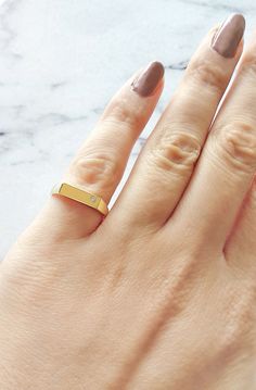 18K 14K 9K Rectangular Bar Signet Ring, Diamond Signet ring, Solid Gold Signet ring, Personalized Custom Signet ring, Women Pinky ring, 9K signet diamond ring, FREE EXPRESS SHIPPING Trendy, yet classic chevalier/signet ring set with a single diamond and made in 18K, 14K or 9K solid gold. Customize your signet ring! Engraving service available here: https://www.etsy.com/listing/632275620 ------------------------------------------ R I N G S P E C S Rectangular: 11mmx3.5mm Band: Starting at the bot Signet Ring Diamond, Signet Ring Women, Ring Engraving, Custom Signet Ring, Diamond Signet Ring, Types Of Gold, Gold Signet Ring, Ring Women, Ring Diamond