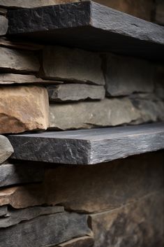 some shelves made out of stone stacked on top of each other