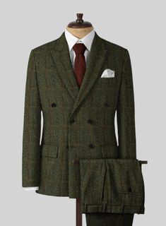 Reinvigorate yourself with an essential wardrobe update by introducing our Harris Tweed Country Green Suit. Crafted from wool, the suit has a coarse texture but assures complete warmth and comfort, is suitable to be dressed up or down depending on the occasion and always injects class into any look.  
 
Look Includes   Harris Tweed Country Green Fabric  Double Breasted Jacket Style  Peak Lapel   Horn Royal Black  Buttons  Single Vent  Three Cuff Buttons  Two Welted Back Pockets on Trousers   You Wool Suits With Herringbone Pattern For Business Casual, Tailored Wool Suit With Herringbone Pattern, Tailored Wool Suits With Herringbone Pattern, Herringbone Tweed Jacket For Business, Winter Tweed Three-piece Business Suit, Winter Tweed Three-piece Suit For Business, Winter Business Tweed Three-piece Suit, Winter Formal Tweed Three-piece Suit, Tweed Herringbone Suit For Tailoring