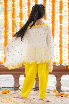 Off white tunic with sequin embroidery and scalloped edges. Paired with an inner top and yellow dhoti pant. - Aza Fashions Bollywood Style Pant Set With Dupatta For Summer, Bollywood Style Summer Pant Set With Dupatta, Summer Sets With Sheer Dupatta And Traditional Drape, Summer Festive Pant Set With Traditional Drape, Traditional White Pant Set For Summer, Traditional Drape Sets With Dupatta For Summer, Summer Sets With Traditional Drape And Dupatta, White Dupatta For Summer Party, Festive White Pant Set With Dupatta