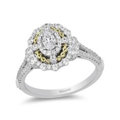 a white and yellow gold ring with diamonds