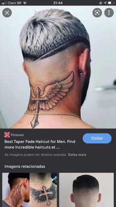 the back of a man's head with tattoos on it