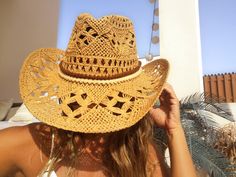 "Hats for women, bohemian hats, boho hats, cowgirl hats, straw cowboy hat, stetson hats, cowboy hats, straw hat, sun hat, buy online cowboy hats for women, sun hats, beach hats, custom hats & personalized hats for women. Jewelry & fashion accessories, original designs by kekugi. Best gift ideas !! This Stylish cowboy hat is accented with pompom ribbons This hat is soft yet supple, making it light to wear yet durable to last for years. These womens hats are perfect for any summer activity Vintage Hats For Western-themed Summer Events, Western Style Brown Panama Hat, Western Brown Panama Hat, Wide Brim Fitted Hat For Beach Season, Fitted Wide Brim Hat For Beach Season, Country Style Wide Brim Panama Hat, Western Wide Brim Sun Hat For Ranch, Western Wide Brim Sun Hat, Fitted Straw Hats For Rodeo