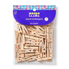 wooden clothes pins 40 count in bag with purple label and blue tag on the front