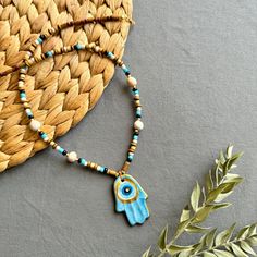 🌟 Designed for those who like to be original and looking for unique jewelry  ✅ Each piece is hand-shaped and drawn by us, making it wonderfully unique--so, expect a bit of delightful variation from the pictures 🍀 Because of their handmade charm, every ceramic piece is entirely one-of-a-kind. These high-quality creations are made to last, just like the memories you'll create with them!  🎁 It is suitable for every day , it can also be purchased as a perfect gift for special days like Valentine's Day, Mother's Day, Christmas or Birthday gift 🧿 Turkish evil eye  The evil eye symbolizes protection from bad energy and envy in Turkish and Middle Eastern culture The evil eye bead is believed to bring good vibes and good luck, we hope it will give you the same feeling! 📦 Packing :  All necklac Unique Pendant Necklace For Souvenirs, Turquoise Hand Painted Jewelry Gift, Handmade Spiritual Jewelry For Souvenir, Hand Painted Turquoise Jewelry Gift, Handmade Spiritual Jewelry As Souvenir, Hand Painted Blue Spiritual Necklace, Handmade Symbolic Pendant Necklace, Handmade Spiritual Necklaces As Souvenir, Hand Painted Beaded Bohemian Necklace As Gift